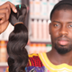 Abdukhar Ndoo showing a Strawberry style human hair extensions in Grand Yoff, Dakar.
